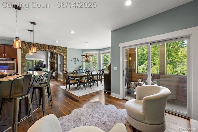 5432 Blood Rd, Metamora, MI 48455 - living area with recessed lighting, dark wood-type flooring, and arched walkways