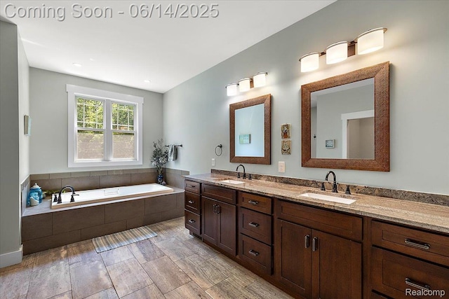 5432 Blood Rd, Metamora, MI 48455 - bathroom with double vanity and a garden tub