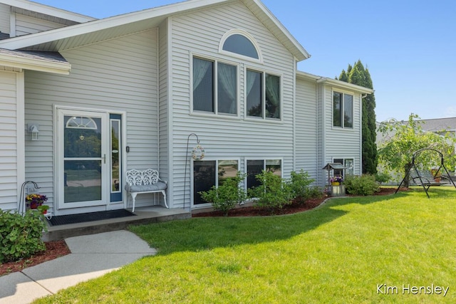 7088 Quintara Dr NE, Comstock Park, MI 49321 - view of front of home featuring a front yard