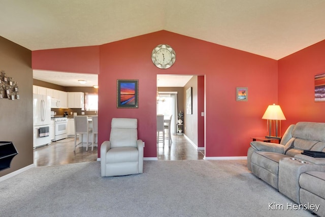 7088 Quintara Dr NE, Comstock Park, MI 49321 - living area featuring light carpet and lofted ceiling