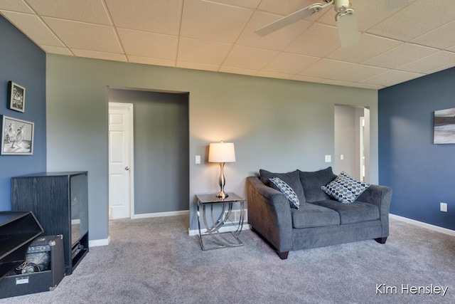 7088 Quintara Dr NE, Comstock Park, MI 49321 - carpeted living room featuring a paneled ceiling and a ceiling fan