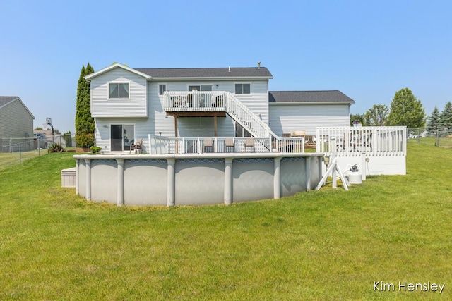 7088 Quintara Dr NE, Comstock Park, MI 49321 - back of property featuring a deck