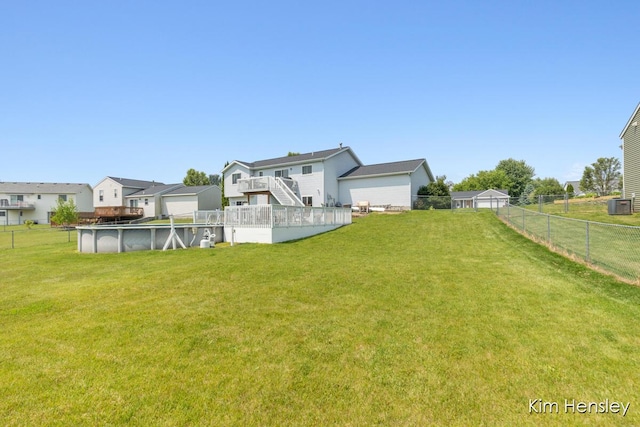 7088 Quintara Dr NE, Comstock Park, MI 49321 - fenced backyard featuring a residential view