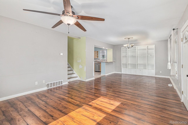 92 Gallup St, Mount Clemens, MI 48043 - unfurnished living room with a chandelier, wood finished floors, stairway, and ceiling fan