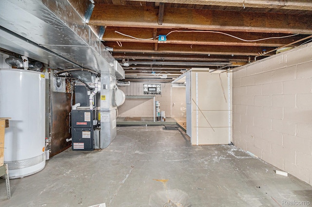 92 Gallup St, Mount Clemens, MI 48043 - unfinished below grade area featuring water heater and heating unit