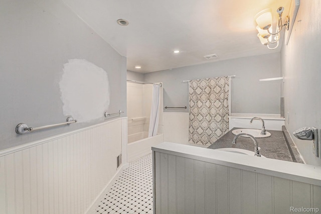 92 Gallup St, Mount Clemens, MI 48043 - bathroom featuring wainscoting, bathtub / shower combination, vanity, and recessed lighting