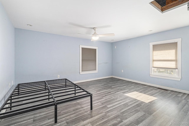 92 Gallup St, Mount Clemens, MI 48043 - empty room with wood finished floors and ceiling fan
