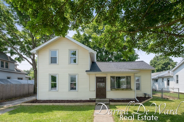 612 E Green St, Hastings, MI 49058 - traditional-style house featuring roof with shingles