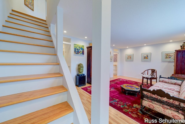 1366 W Norton Ave, Muskegon, MI 49441 - staircase featuring wood finished floors and recessed lighting