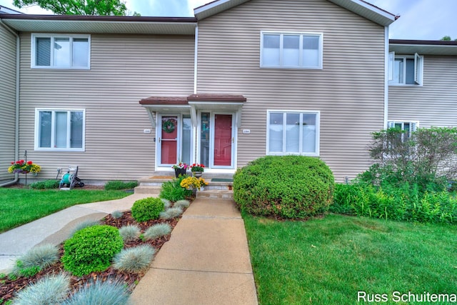 1366 W Norton Ave, Muskegon, MI 49441 - view of front of property featuring a front lawn