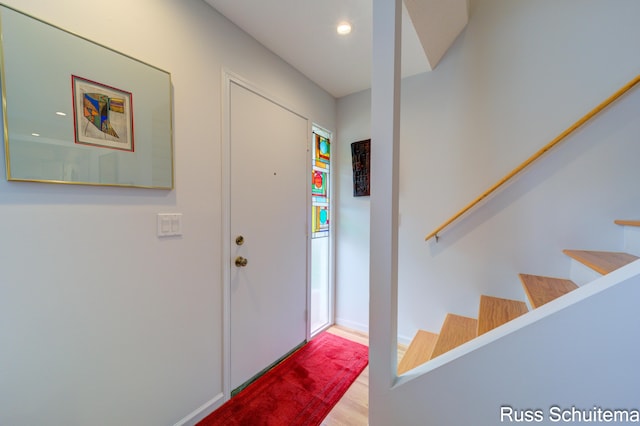 1366 W Norton Ave, Muskegon, MI 49441 - foyer with stairway, wood finished floors, and recessed lighting