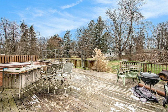 8887 Elm Valley Rd, Union Pier, MI 49129 - wooden deck featuring view of scattered trees and area for grilling