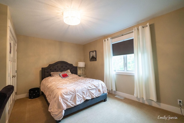 14921 Creek Edge Dr, Holland, MI 49424 - carpeted bedroom featuring baseboards