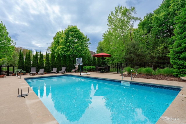 14921 Creek Edge Dr, Holland, MI 49424 - view of swimming pool with a patio