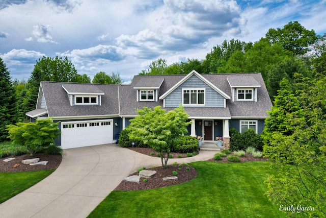 14921 Creek Edge Dr, Holland, MI 49424 - view of front facade with a shingled roof, driveway, a front lawn, and covered porch