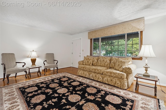 5614 Warbler Dr, Clarkston, MI 48346 - living room featuring a textured ceiling, ornamental molding, and wood finished floors