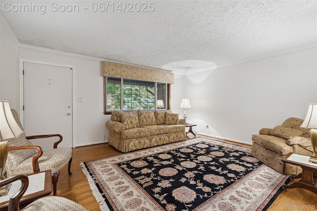 5614 Warbler Dr, Clarkston, MI 48346 - living room featuring a textured ceiling, crown molding, and wood finished floors