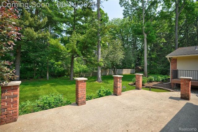 5614 Warbler Dr, Clarkston, MI 48346 - view of patio featuring view of scattered trees