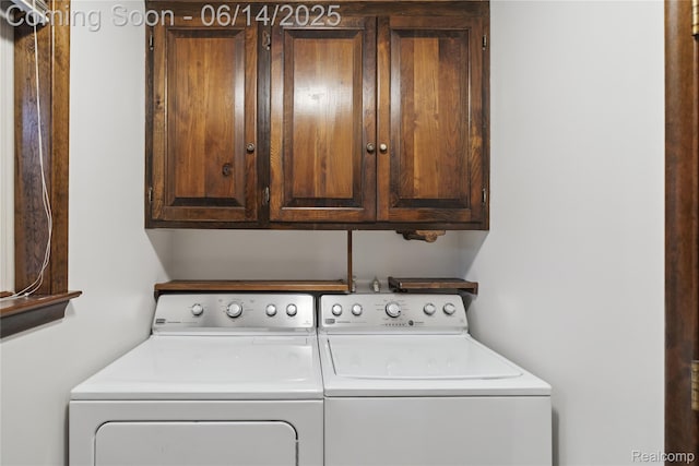 5614 Warbler Dr, Clarkston, MI 48346 - laundry room featuring cabinet space and washer and clothes dryer