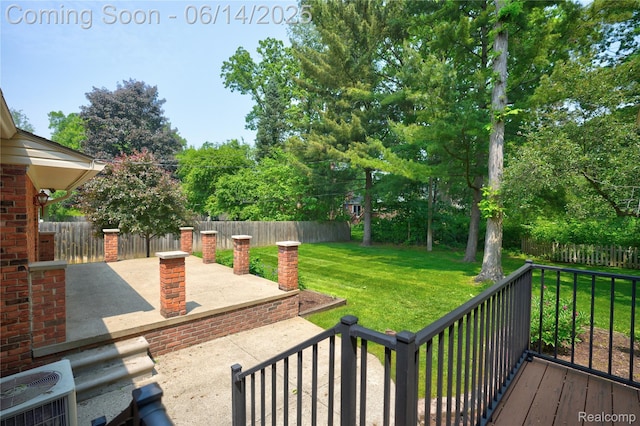 5614 Warbler Dr, Clarkston, MI 48346 - view of yard featuring a patio and view of wooded area