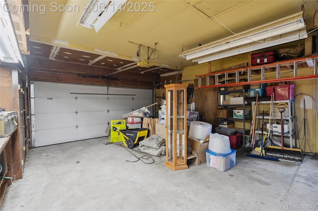 5614 Warbler Dr, Clarkston, MI 48346 - garage with a garage door opener