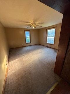 313 Morse St, Ionia, MI 48846 - empty room featuring light colored carpet and a ceiling fan