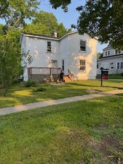 313 Morse St, Ionia, MI 48846 - view of front of home with a front yard