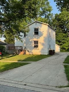 313 Morse St, Ionia, MI 48846 - view of side of property featuring a lawn
