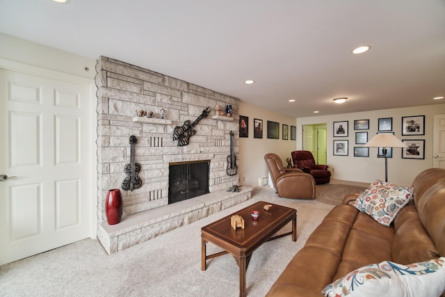 3524 Lakeshore Rd, Manistee, MI 49660 - carpeted living room with recessed lighting and a stone fireplace