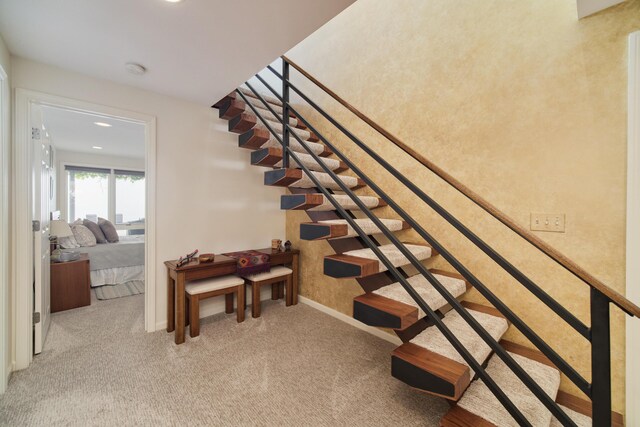 3524 Lakeshore Rd, Manistee, MI 49660 - staircase with carpet and recessed lighting