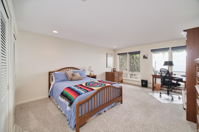 3524 Lakeshore Rd, Manistee, MI 49660 - bedroom with carpet flooring, a desk, recessed lighting, and a baseboard radiator