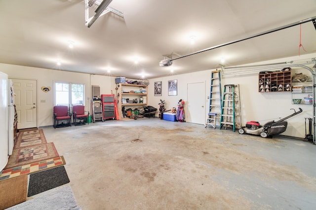 3524 Lakeshore Rd, Manistee, MI 49660 - garage featuring a garage door opener