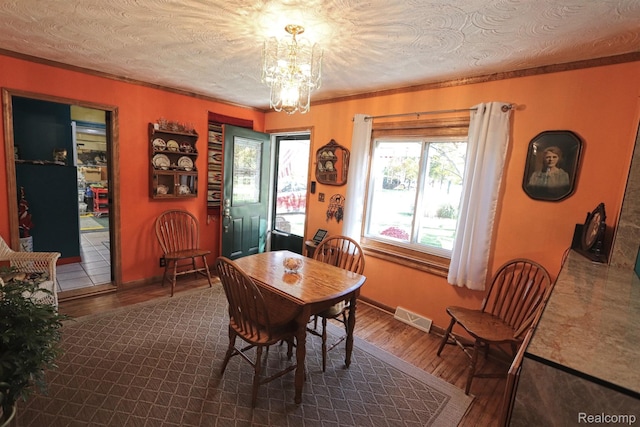 33566 Rhonswood St, Farmington Hills, MI 48335 - dining area with dark wood-style flooring and a chandelier