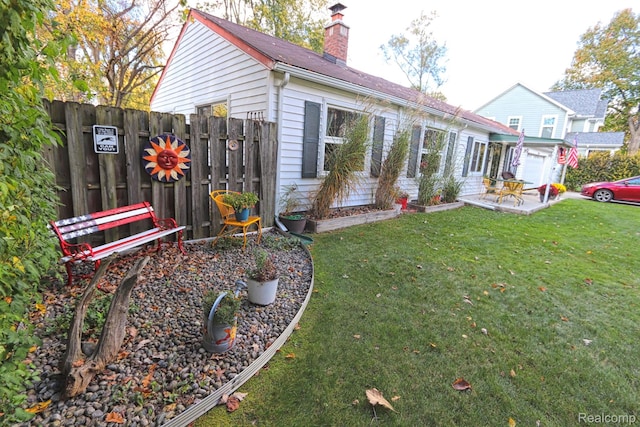 33566 Rhonswood St, Farmington Hills, MI 48335 - view of side of property with a chimney