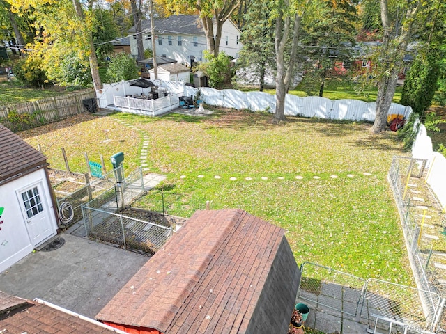 33566 Rhonswood St, Farmington Hills, MI 48335 - fenced backyard featuring a garden