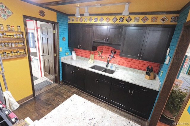 33566 Rhonswood St, Farmington Hills, MI 48335 - kitchen with dark wood-style floors, backsplash, dark cabinets, and light stone countertops