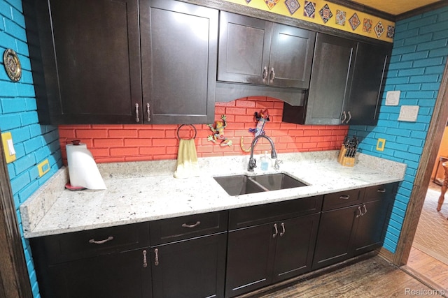 33566 Rhonswood St, Farmington Hills, MI 48335 - kitchen with decorative backsplash, wood finished floors, and light stone counters