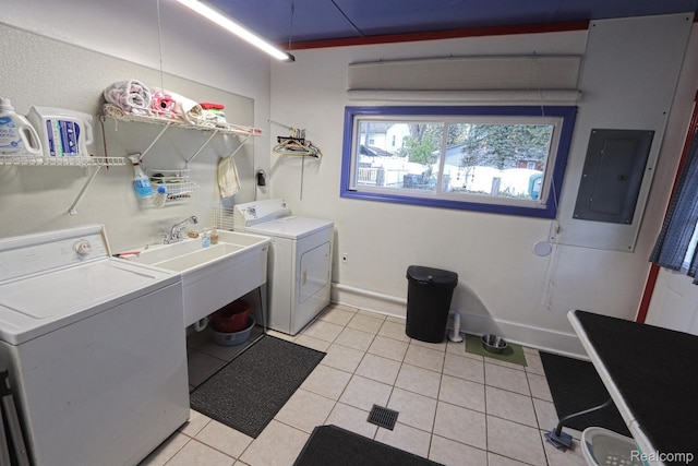33566 Rhonswood St, Farmington Hills, MI 48335 - laundry room featuring electric panel, washing machine and clothes dryer, and light tile patterned floors