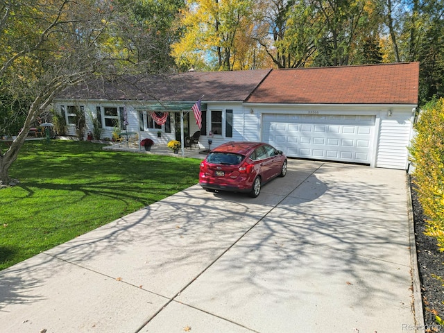 33566 Rhonswood St, Farmington Hills, MI 48335 - single story home with driveway, a front lawn, and a garage