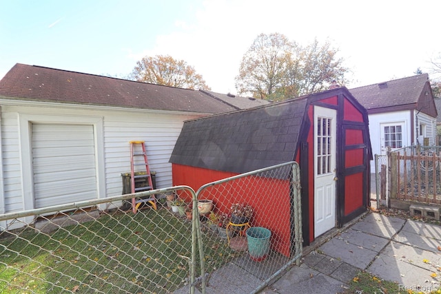 33566 Rhonswood St, Farmington Hills, MI 48335 - view of shed with a gate