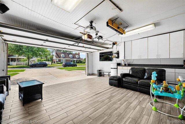 7561 Esper Blvd, Dearborn, MI 48126 - garage with fridge and a garage door opener