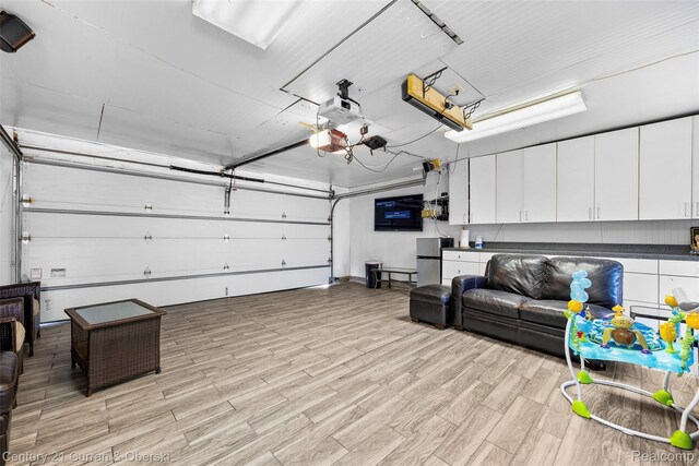 7561 Esper Blvd, Dearborn, MI 48126 - garage featuring fridge and a garage door opener