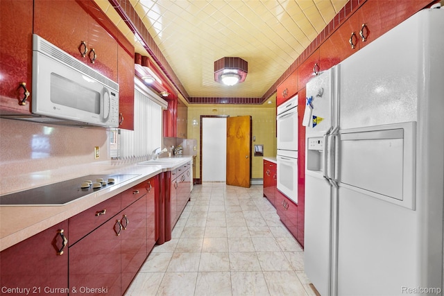 7561 Esper Blvd, Dearborn, MI 48126 - kitchen with white appliances, light countertops, and a raised ceiling