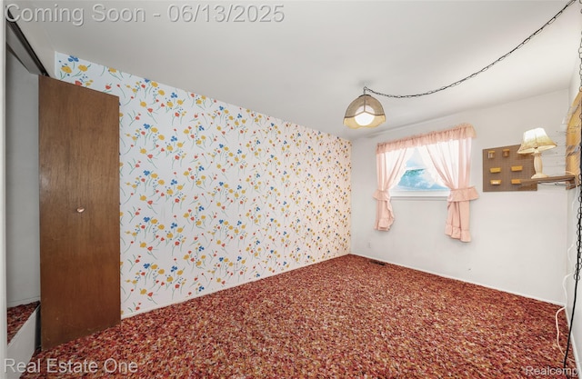 20107 Merle Ct, Eastpointe, MI 48035 - carpeted empty room with wallpapered walls
