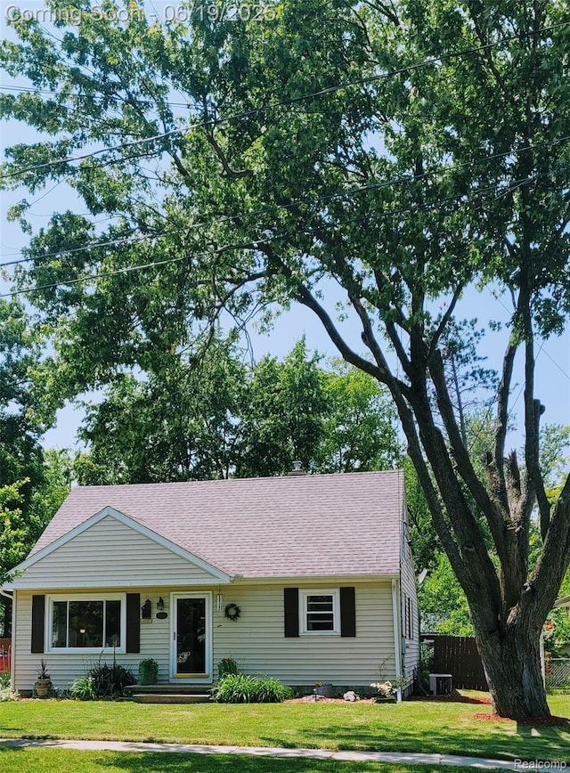 1118 Pine St, Grand Ledge, MI 48837 - view of front of home featuring a shingled roof