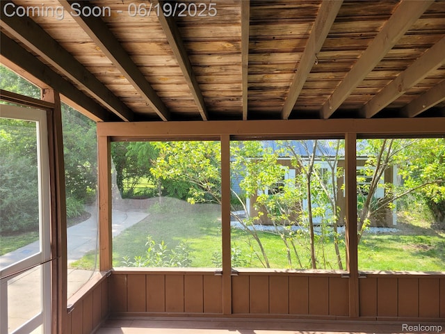 1118 Pine St, Grand Ledge, MI 48837 - unfurnished sunroom featuring plenty of natural light and a wood ceiling with exposed beams