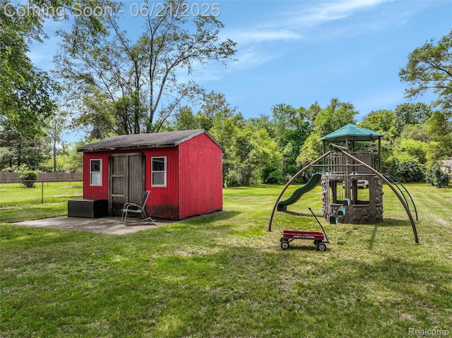 10997 Stark Rd, Livonia, MI 48150 - view of yard featuring a playground and an outbuilding