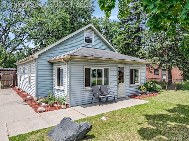 10997 Stark Rd, Livonia, MI 48150 - view of front of property with a patio and a chimney