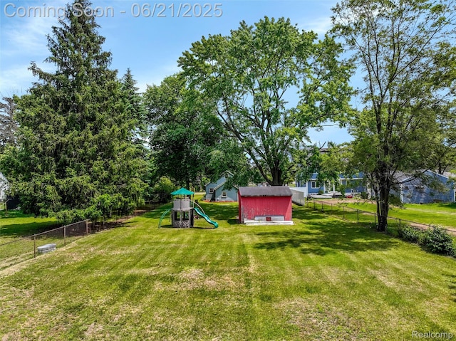 10997 Stark Rd, Livonia, MI 48150 - view of yard with a playground and a shed