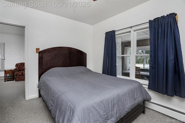 10997 Stark Rd, Livonia, MI 48150 - bedroom with baseboard heating and carpet flooring